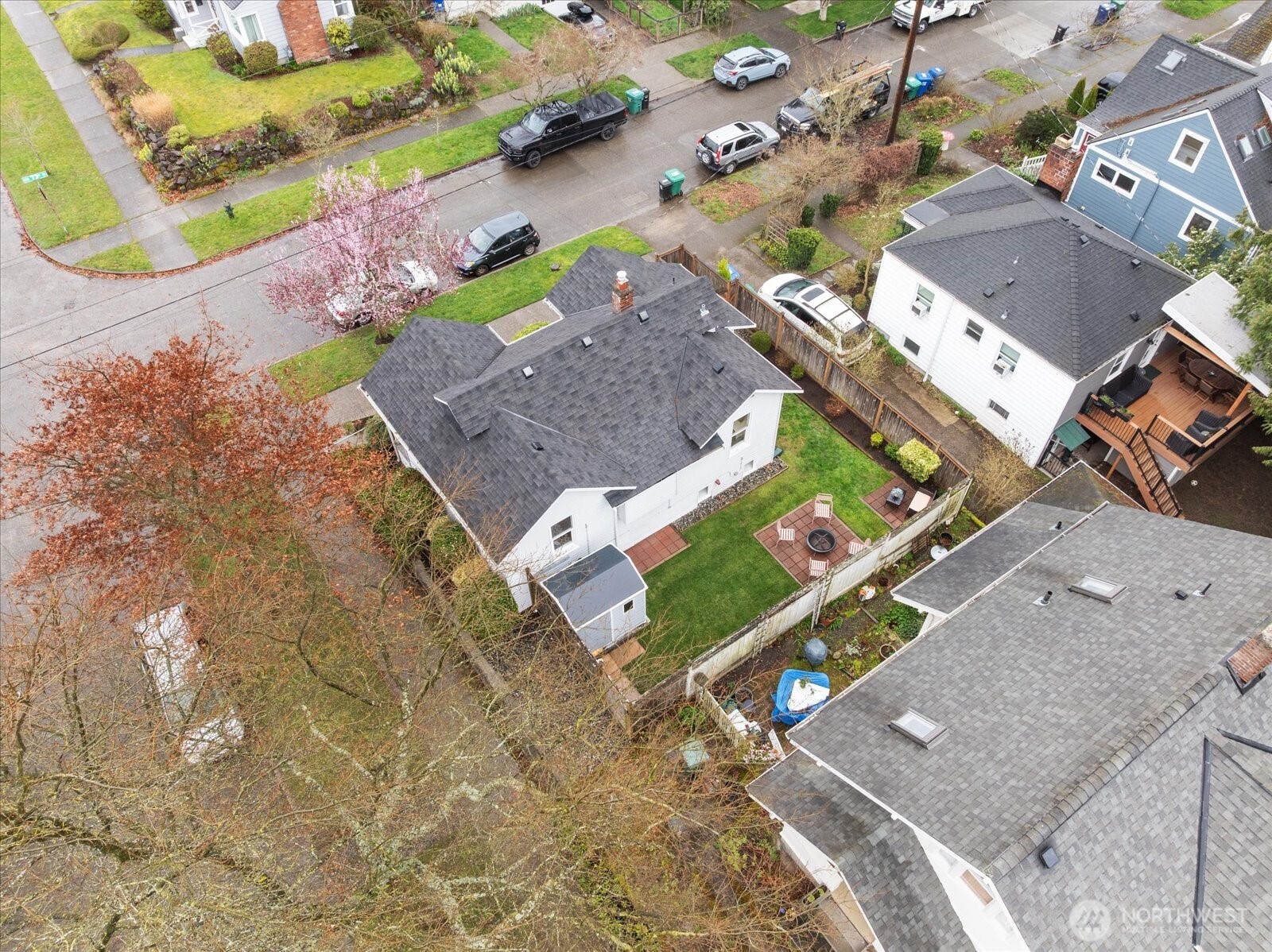 2857 Northwest 73rd Street Seattle, WA 98117 - Photo 20 of 25 an aerial view of a house with a yard and a swimming pool