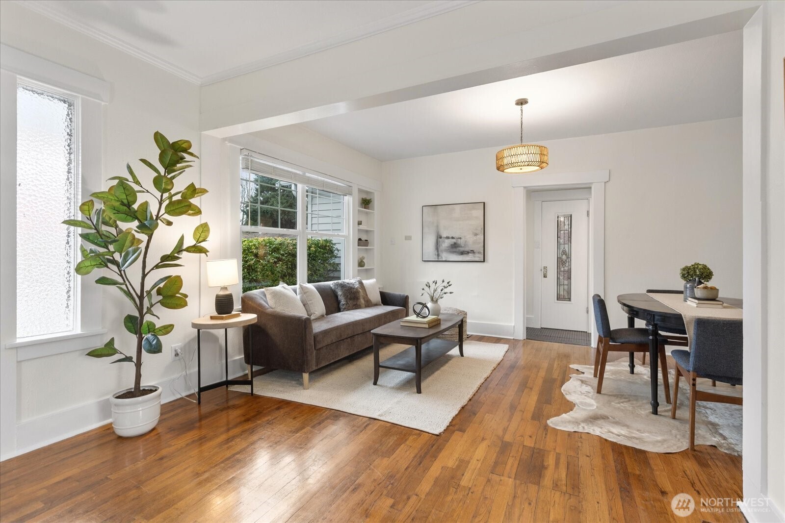 2857 Northwest 73rd Street Seattle, WA 98117 - Photo 3 of 25 a living room with furniture and a large window