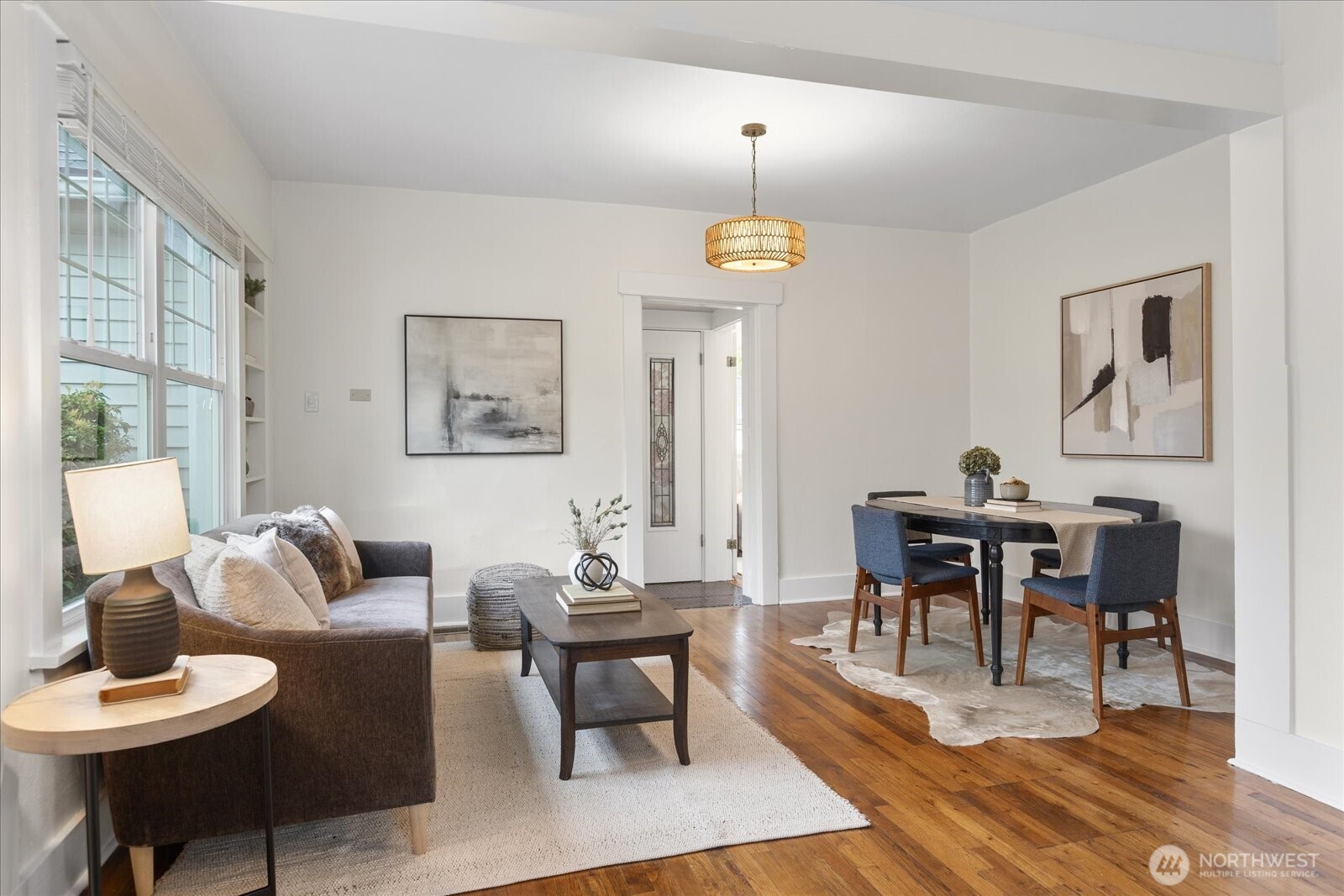 2857 Northwest 73rd Street Seattle, WA 98117 - Photo 6 of 25 a living room with furniture and a wooden floor