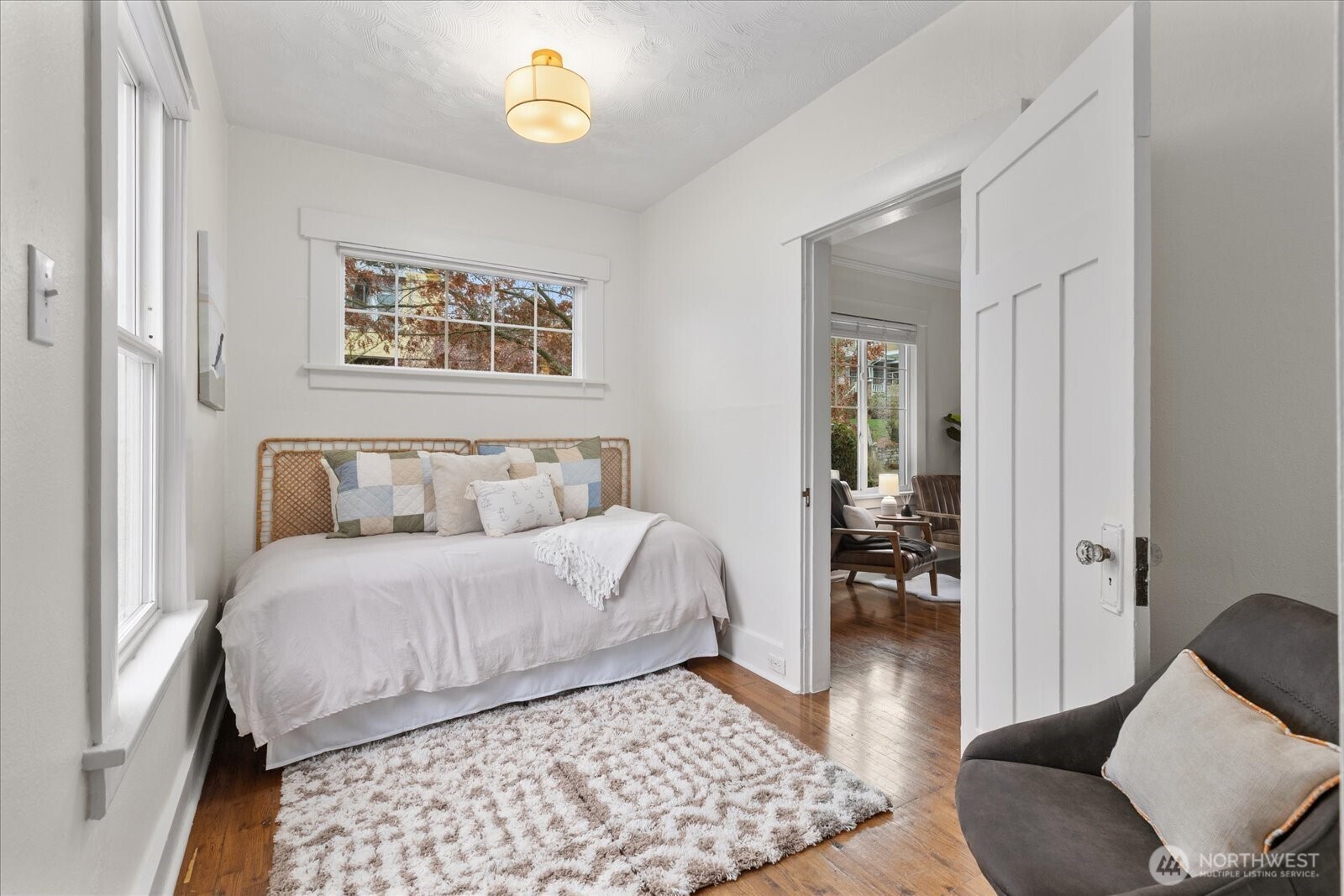 2857 Northwest 73rd Street Seattle, WA 98117 - Photo 10 of 25 a bedroom with a bed and a couch