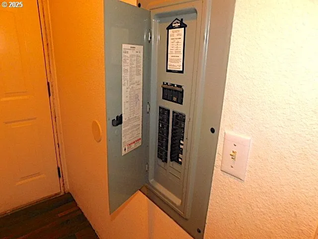 a view of a hallway with a wooden door