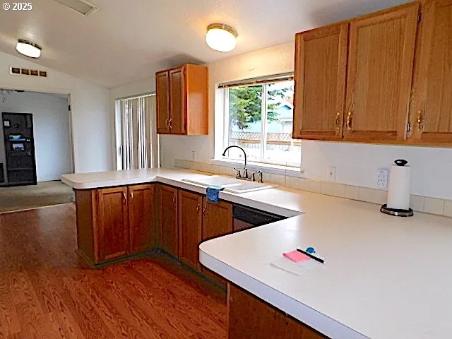 a view of a room with a bed and couch