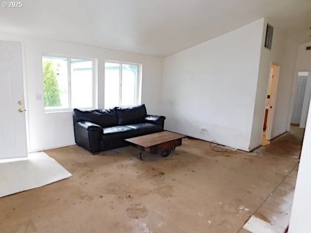 a bathroom with a sink a toilet a mirror and vanity