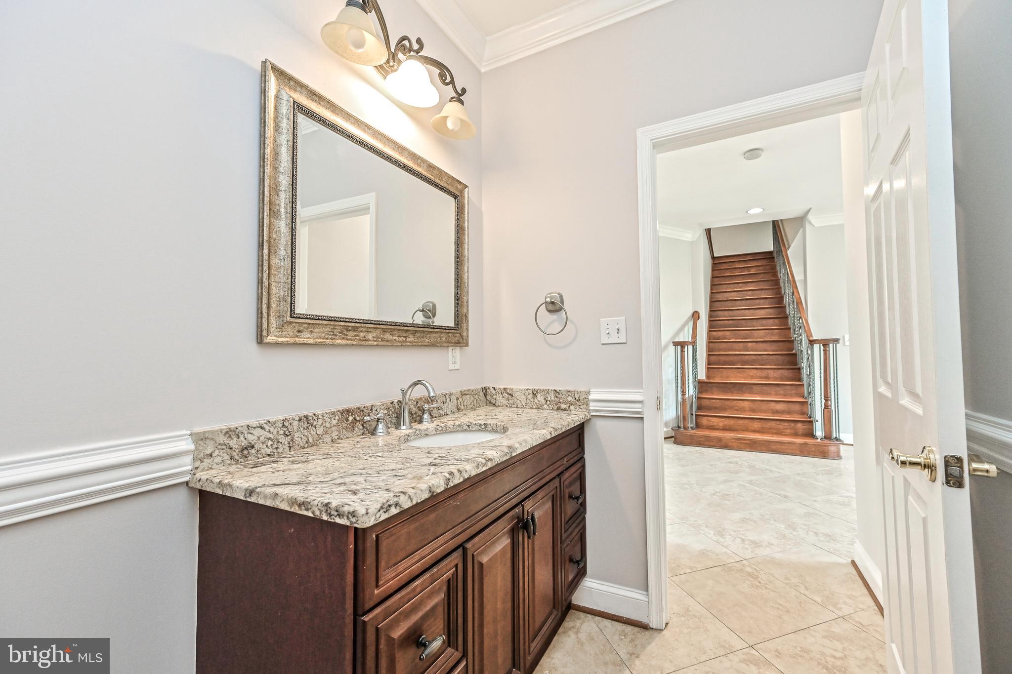 5218 Clinton Road Alexandria, VA 22312 - Photo 35 of 106 main level FB with view to upper stairs