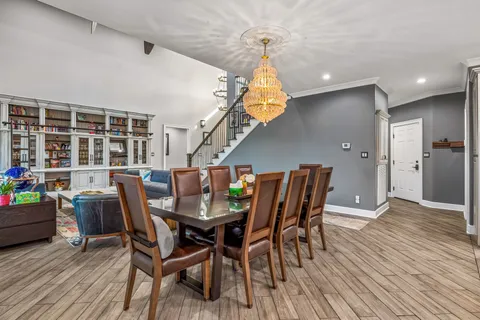 a living room with furniture rug and window