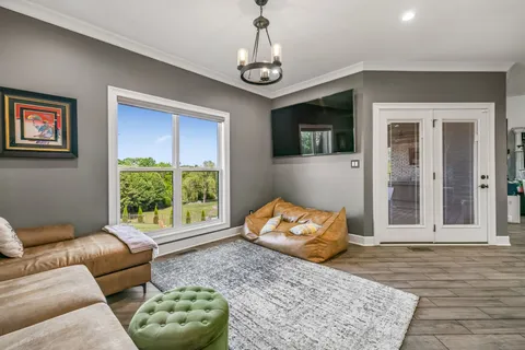 a bedroom with a bed and a table in it