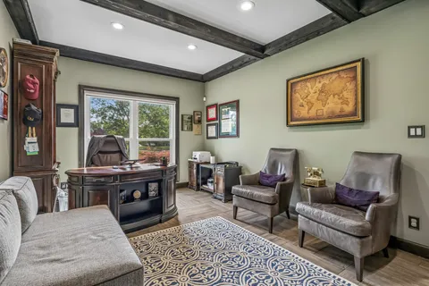 a living room with furniture and a table