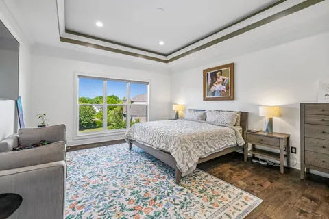 a living room with lots of furniture and white walls