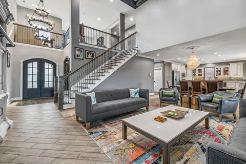 a kitchen with stainless steel appliances granite countertop a stove and a sink