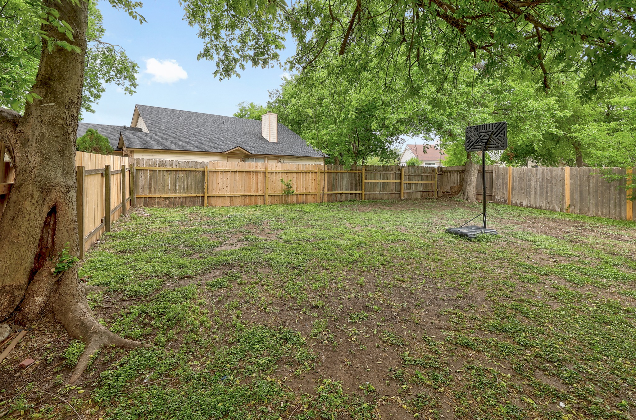 9901 Parliament House Road Austin, TX 78729 - Photo 37 of 40 View of fenced backyard