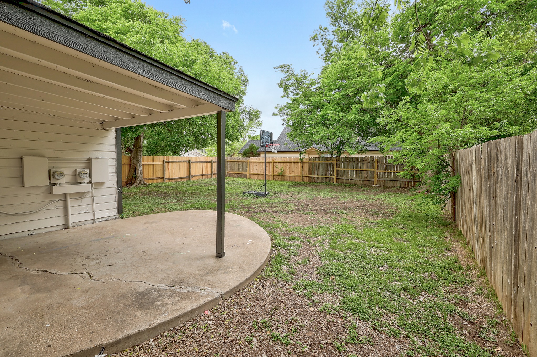 9901 Parliament House Road Austin, TX 78729 - Photo 38 of 40 Fenced backyard featuring a patio
