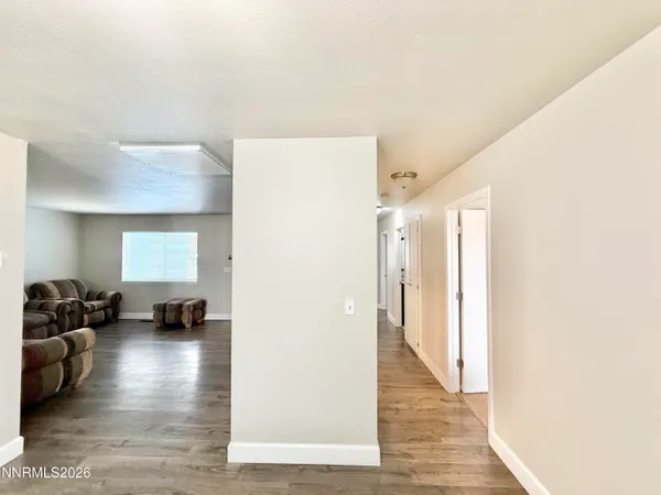 a view of livingroom with furniture and wooden floor