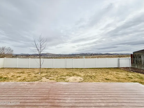 a view of a swimming pool and an outdoor space