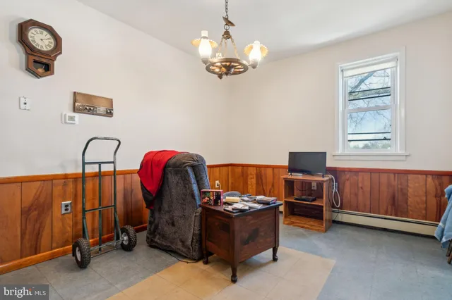 a room with a window and gym equipment