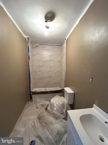 a bathroom with a sink and a toilet