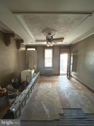 a view of a hallway with windows