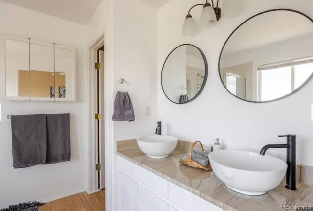 a bathroom with a toilet and a sink