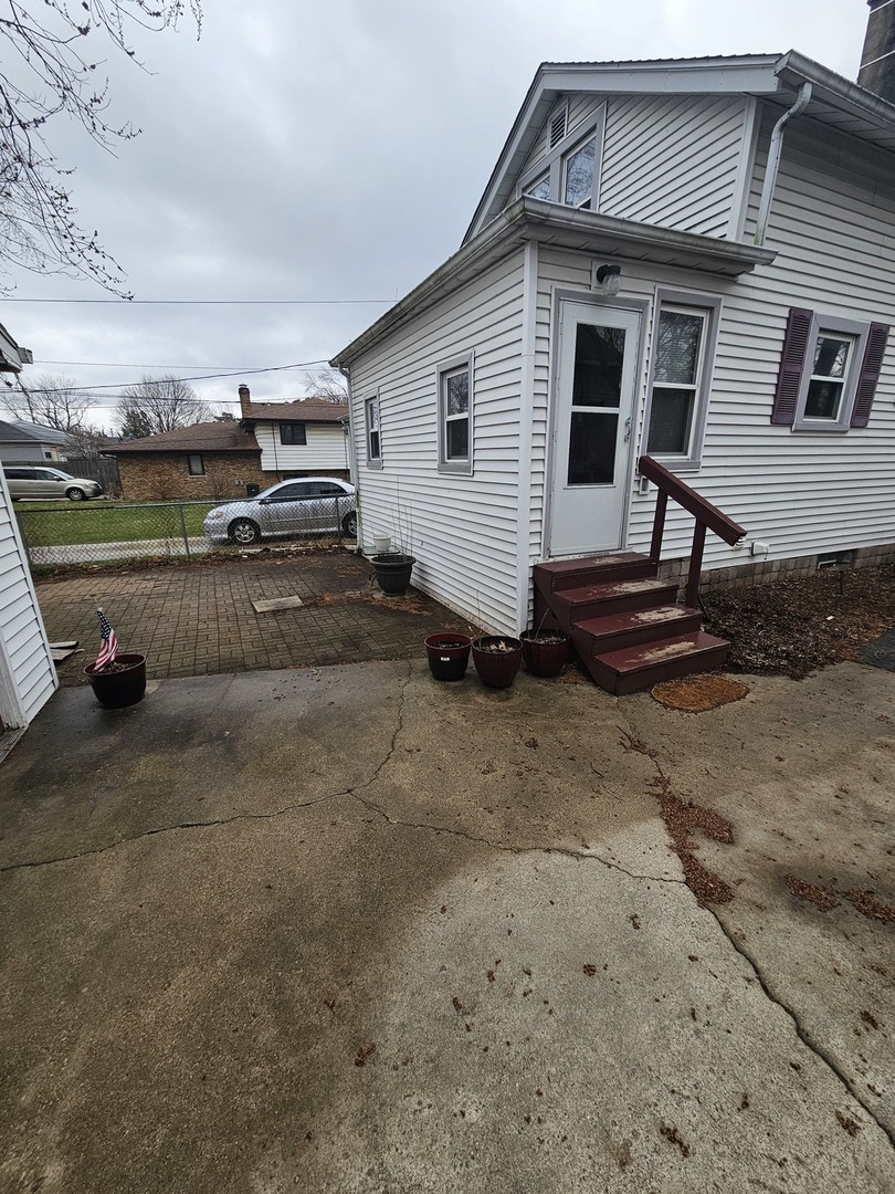 540 East 4th Street Lockport, IL 60441 - Photo 3 of 3 a view of a house with a yard