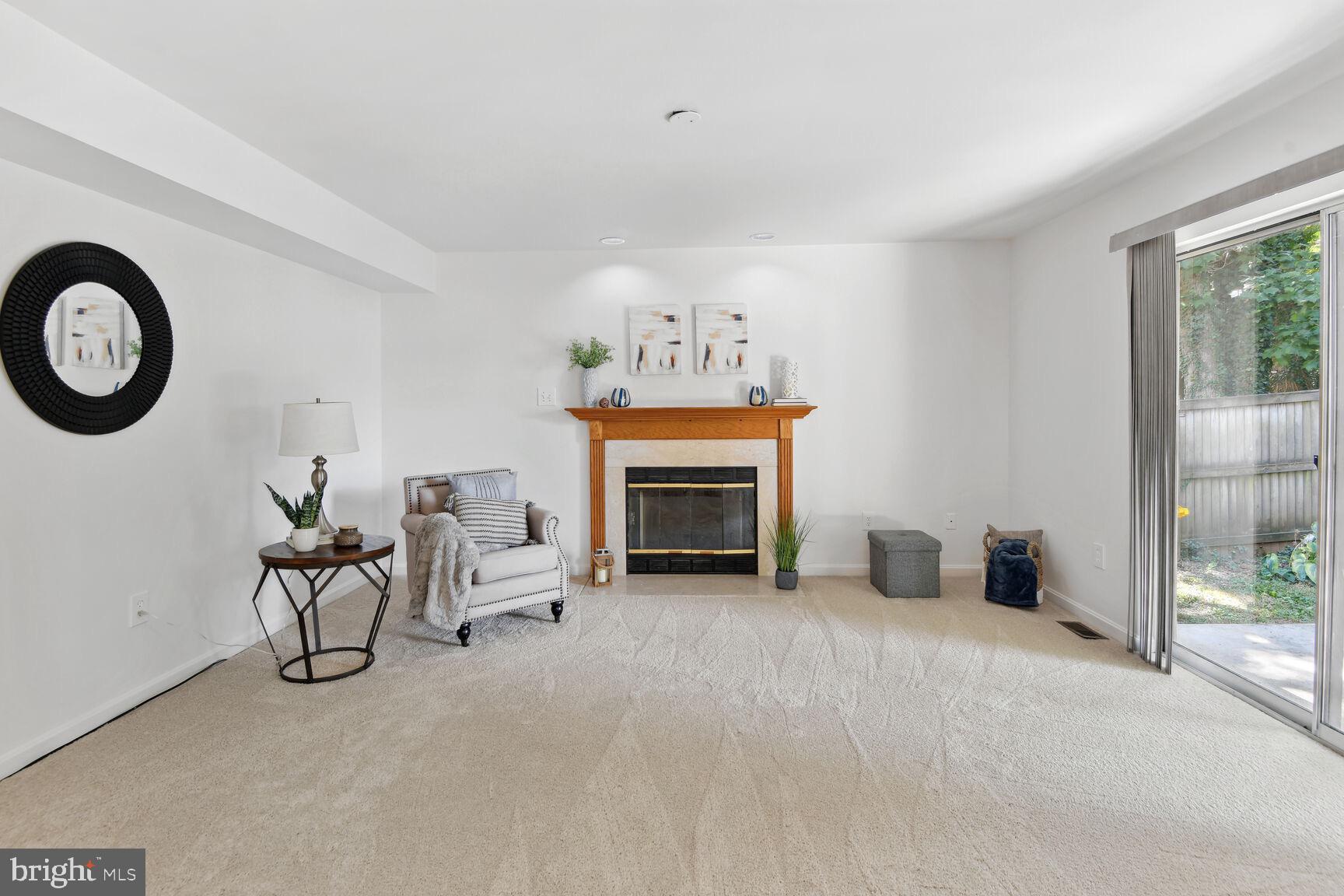 1402 Brenwoode Road Annapolis, MD 21409 - Photo 7 of 29 Family room with fireplace