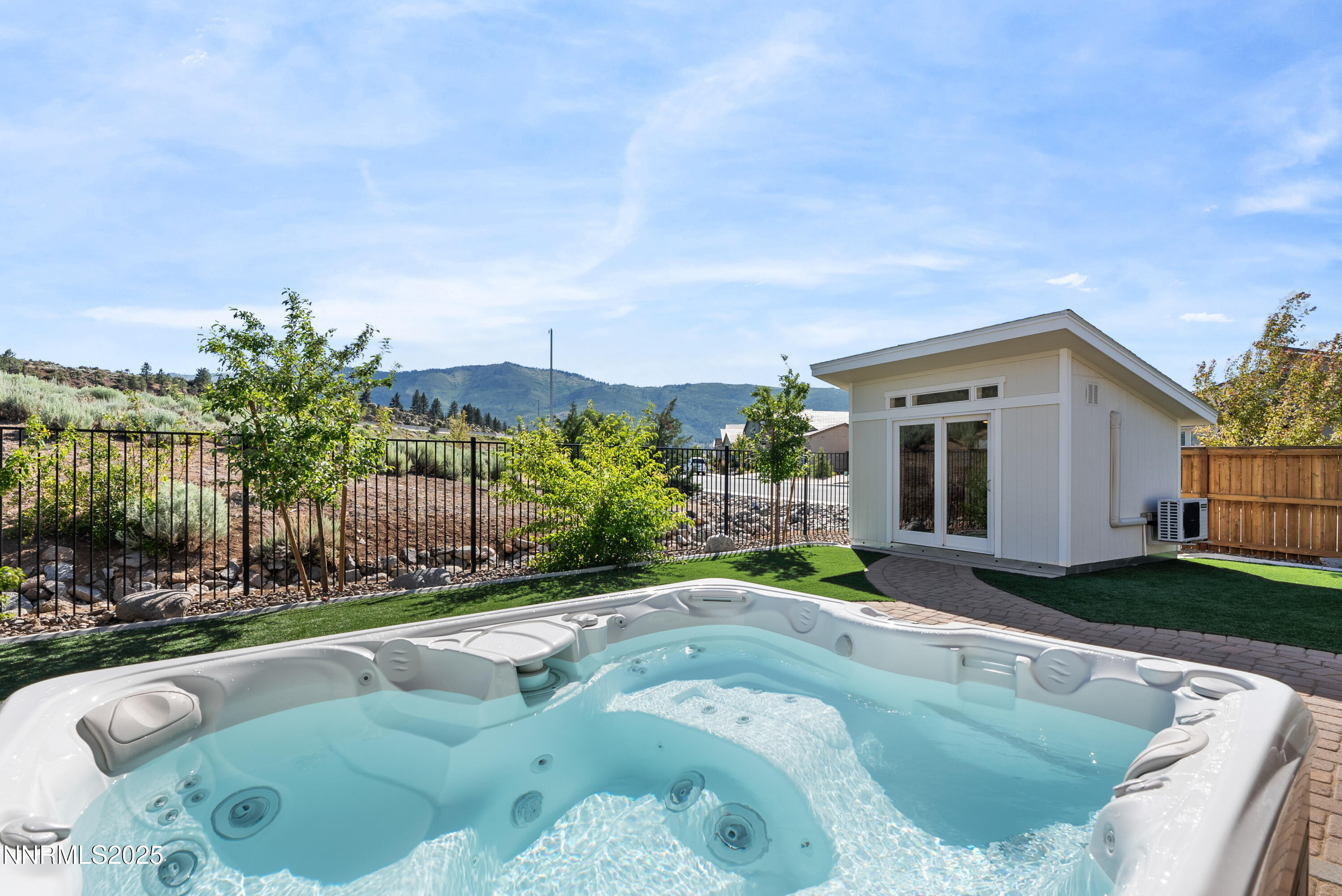 8650 Gasparilla Way Reno, NV 89439 - Photo 25 of 29 a swimming pool with outdoor seating and yard
