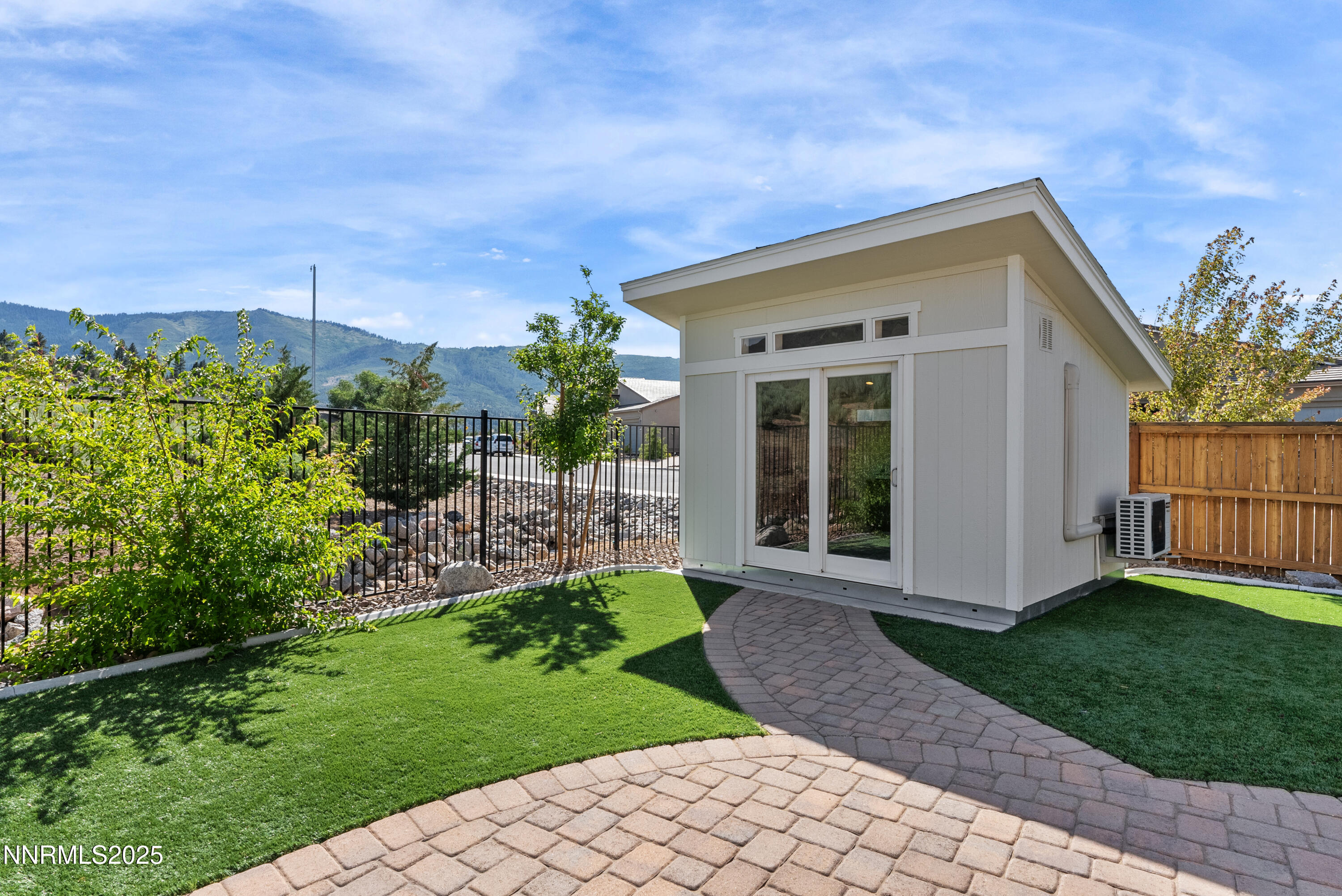 8650 Gasparilla Way Reno, NV 89439 - Photo 26 of 29 a front view of a house with a yard