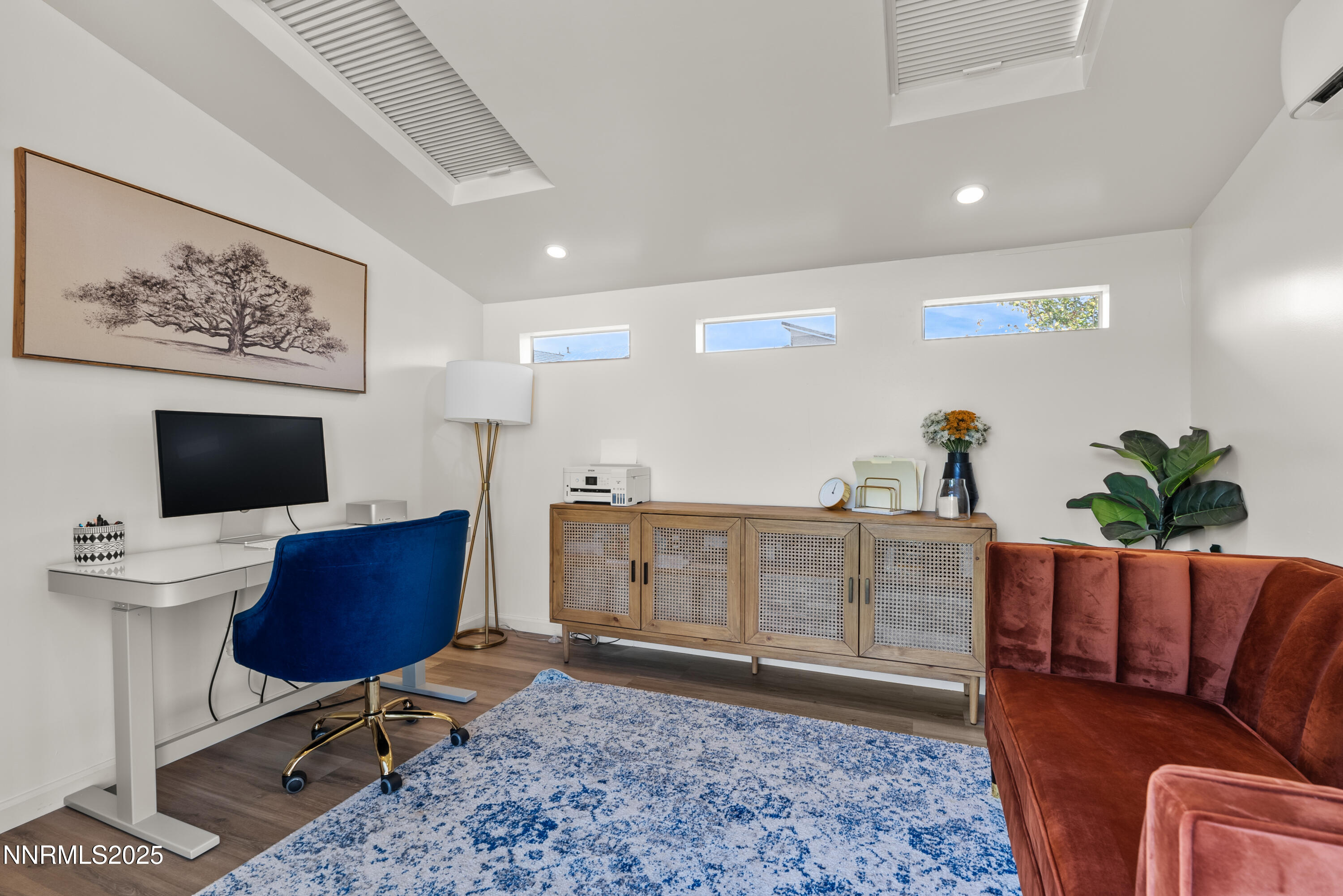 8650 Gasparilla Way Reno, NV 89439 - Photo 27 of 29 a living room with furniture and a flat screen tv