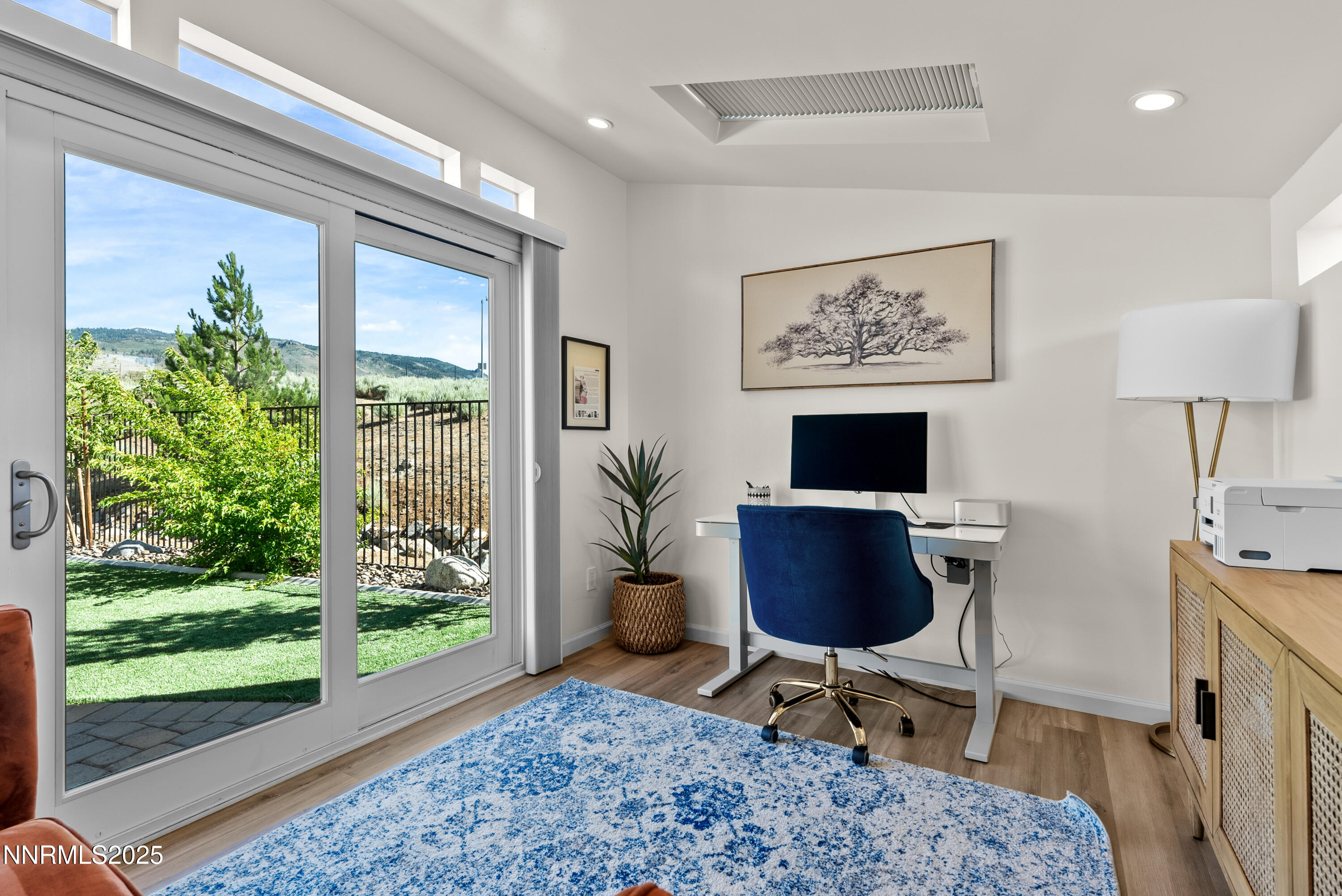 8650 Gasparilla Way Reno, NV 89439 - Photo 28 of 29 a living room with furniture and a floor to ceiling window
