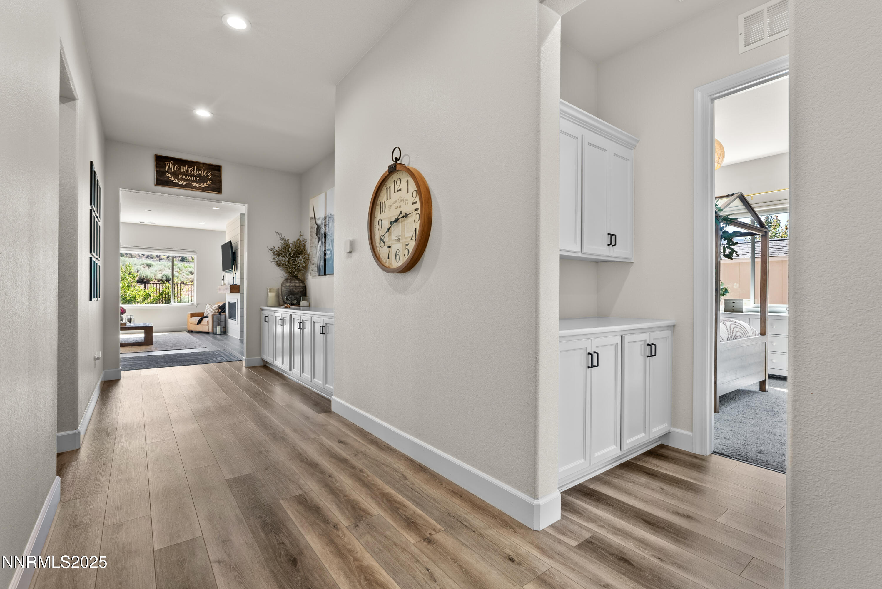 8650 Gasparilla Way Reno, NV 89439 - Photo 3 of 29 a view of a hallway with wooden floor