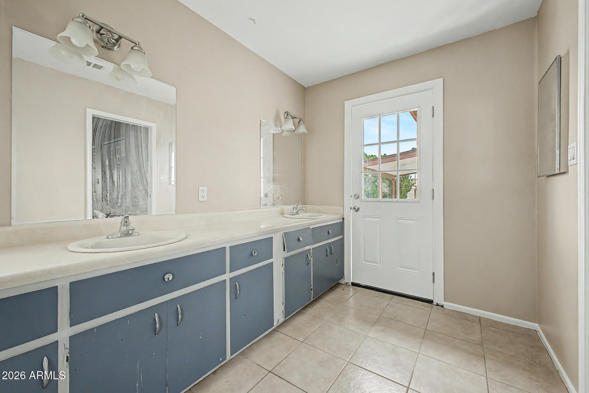 4007 West Mountain View Road Phoenix, AZ 85051 - Photo 19 of 31 a spacious bathroom with a granite countertop sink mirror and