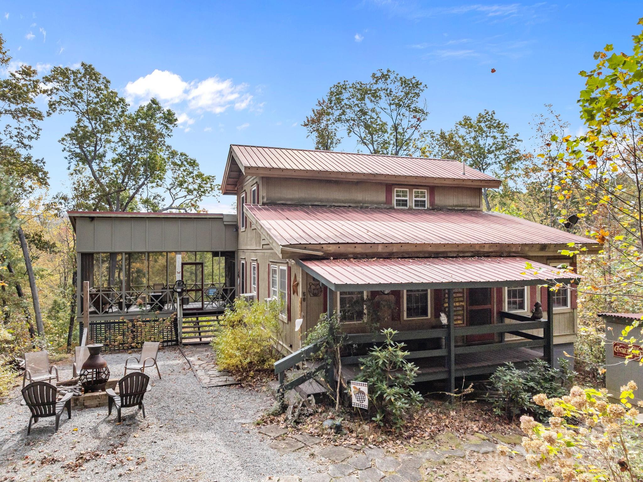 38 Buzzards Rst Trail, Unit 7 Saluda, NC 28773 - Photo 2 of 47 a view of house with outdoor seating space