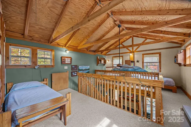 a bathroom with a toilet a sink and a mirror