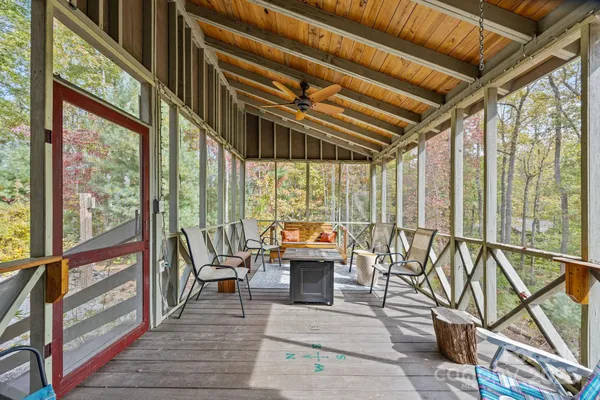 a patio with patio outdoor seating and barbeque oven