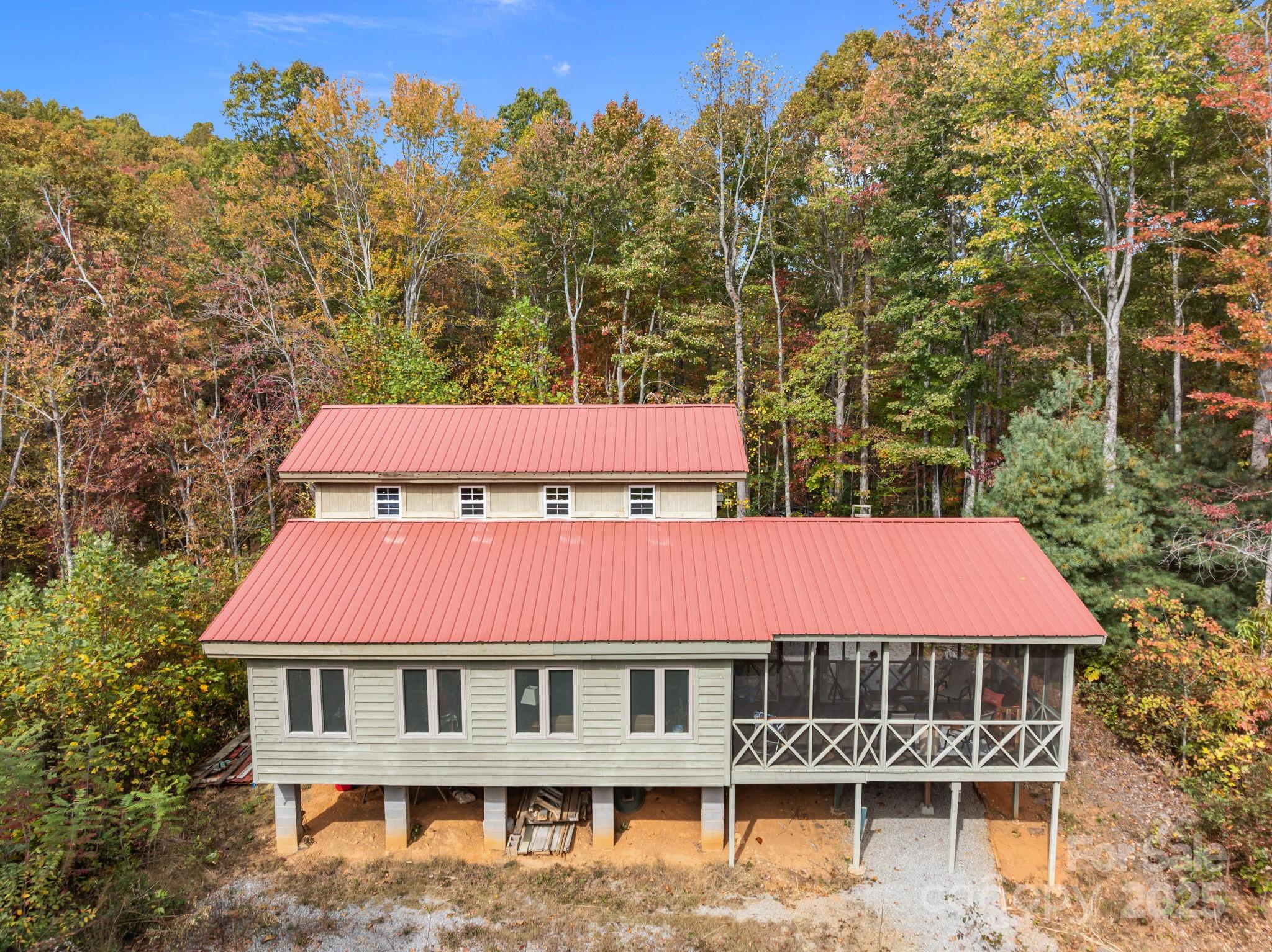 38 Buzzards Rst Trail, Unit 7 Saluda, NC 28773 - Photo 6 of 47 a front view of a house with a yard
