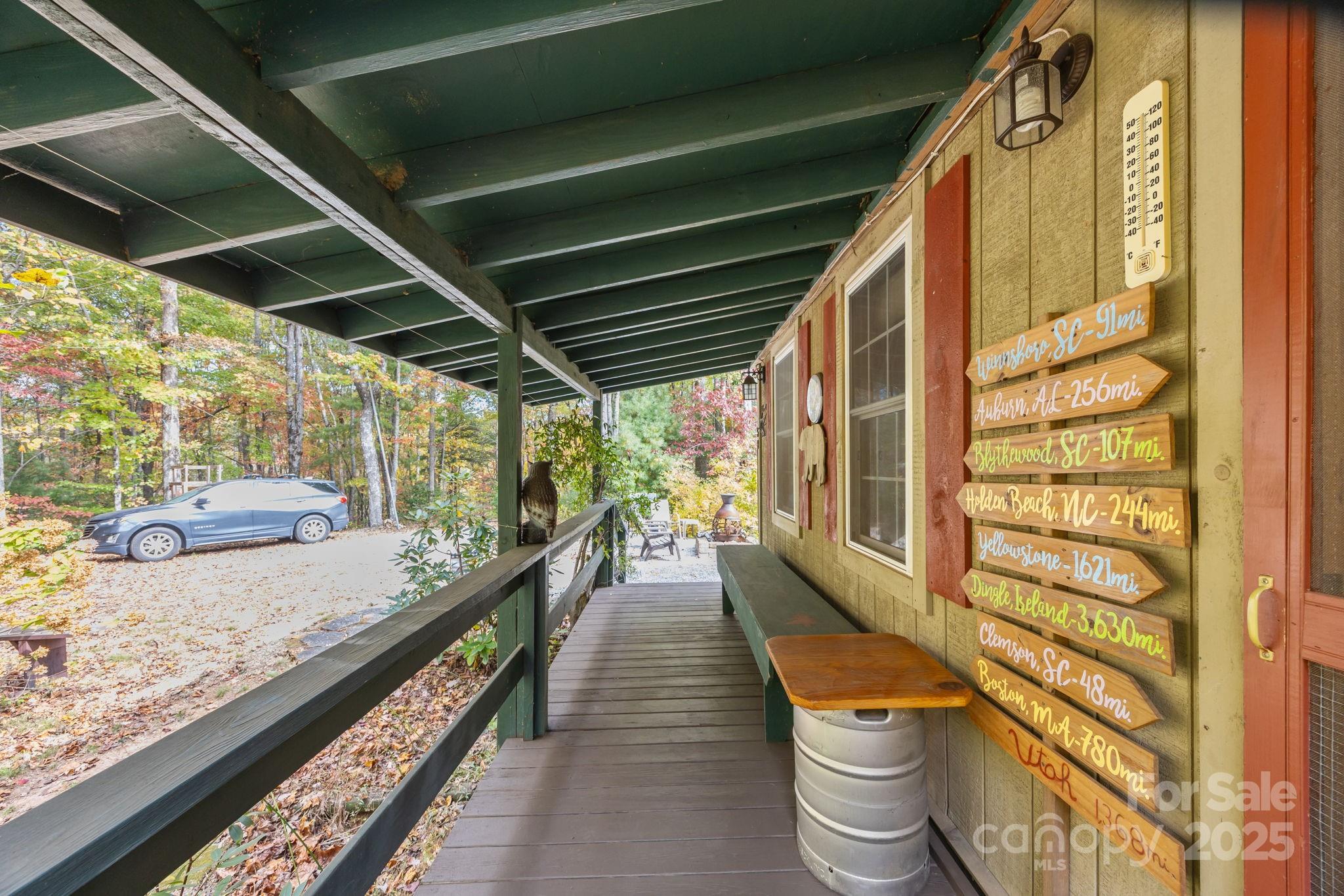 38 Buzzards Rst Trail, Unit 7 Saluda, NC 28773 - Photo 10 of 47 a outdoor space with lots of potted plants