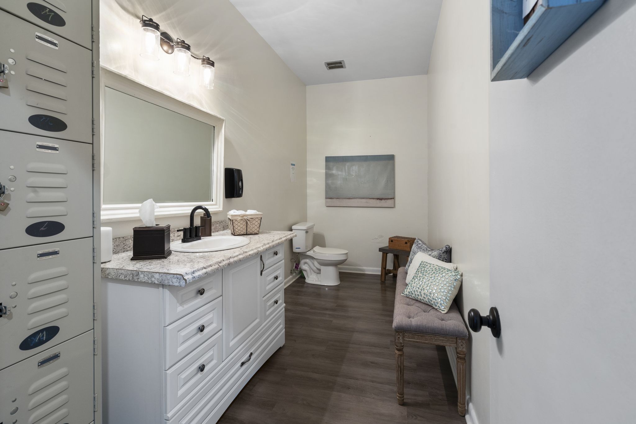 607 Locust Street Springfield, TN 37172 - Photo 12 of 43 a bathroom with a granite countertop sink a toilet and mirror