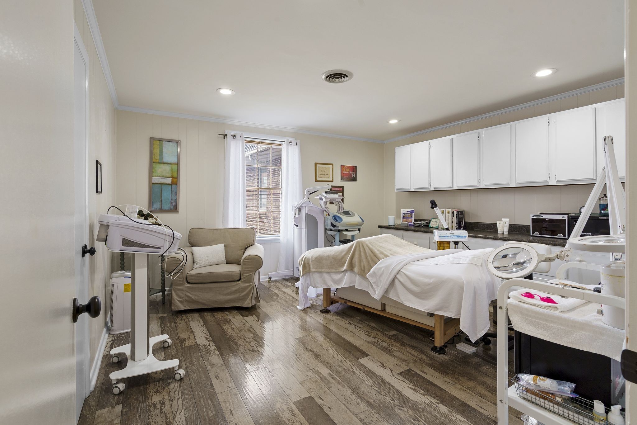 607 Locust Street Springfield, TN 37172 - Photo 9 of 43 a bed room with bed and a couch