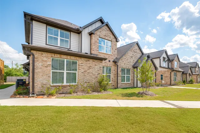 a house view with a garden space