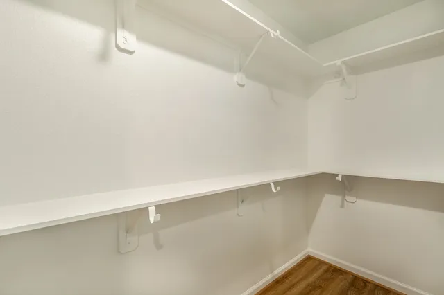 a view of a room with racks on the wall