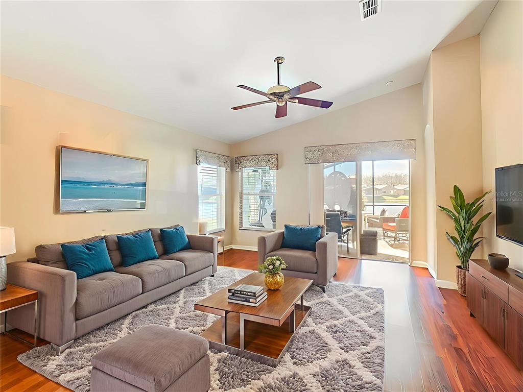 121 Rialto Road Poinciana, FL 34759 - Photo 5 of 68 a living room with furniture and a large window