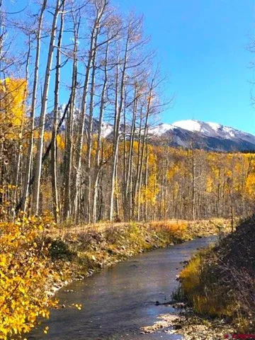 a view of a city with mountains in the background