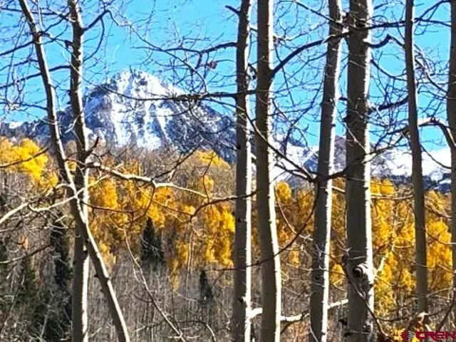 a sign board with lake view