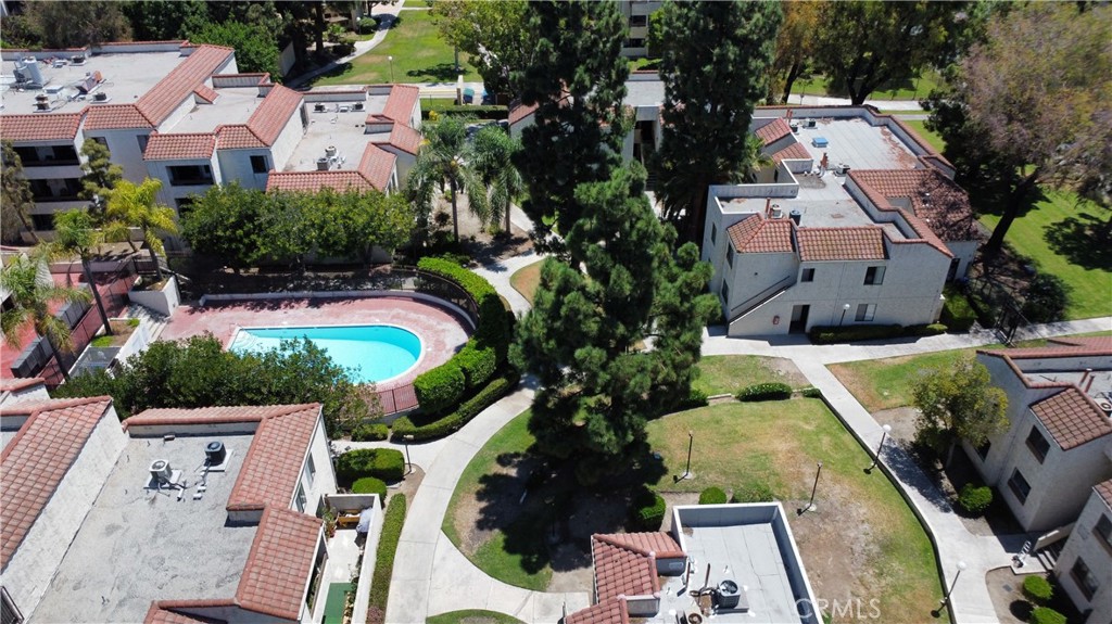 600 West 3rd Street, Unit B211 Santa Ana, CA 92701 - Photo 14 of 21 an aerial view of multiple houses with yard