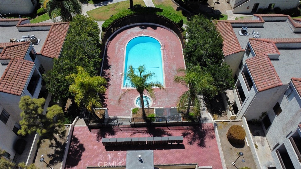 600 West 3rd Street, Unit B211 Santa Ana, CA 92701 - Photo 15 of 21 an aerial view of a house with garden space and swimming pool