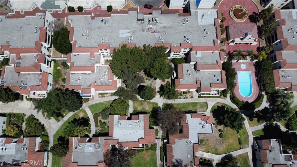600 West 3rd Street, Unit B211 Santa Ana, CA 92701 - Photo 16 of 21 an aerial view of residential houses with outdoor space and parking