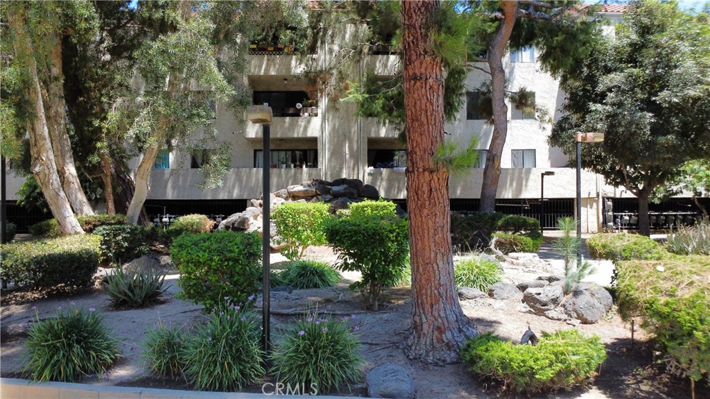 600 West 3rd Street, Unit B211 Santa Ana, CA 92701 - Photo 17 of 21 front view of a house with a street