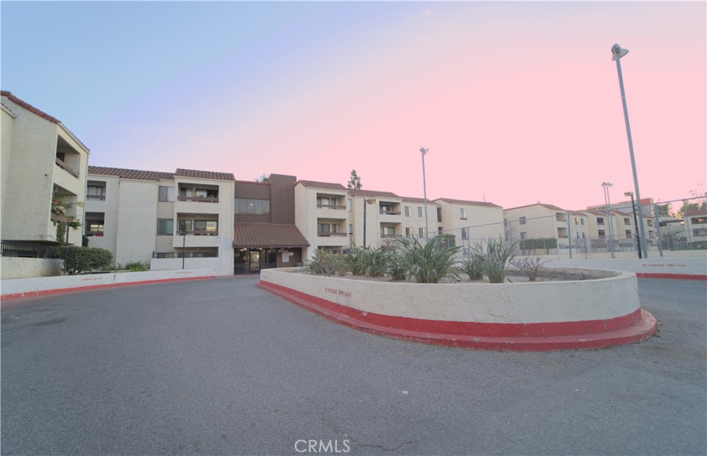 600 West 3rd Street, Unit B211 Santa Ana, CA 92701 - Photo 9 of 21 a view of a house with a street