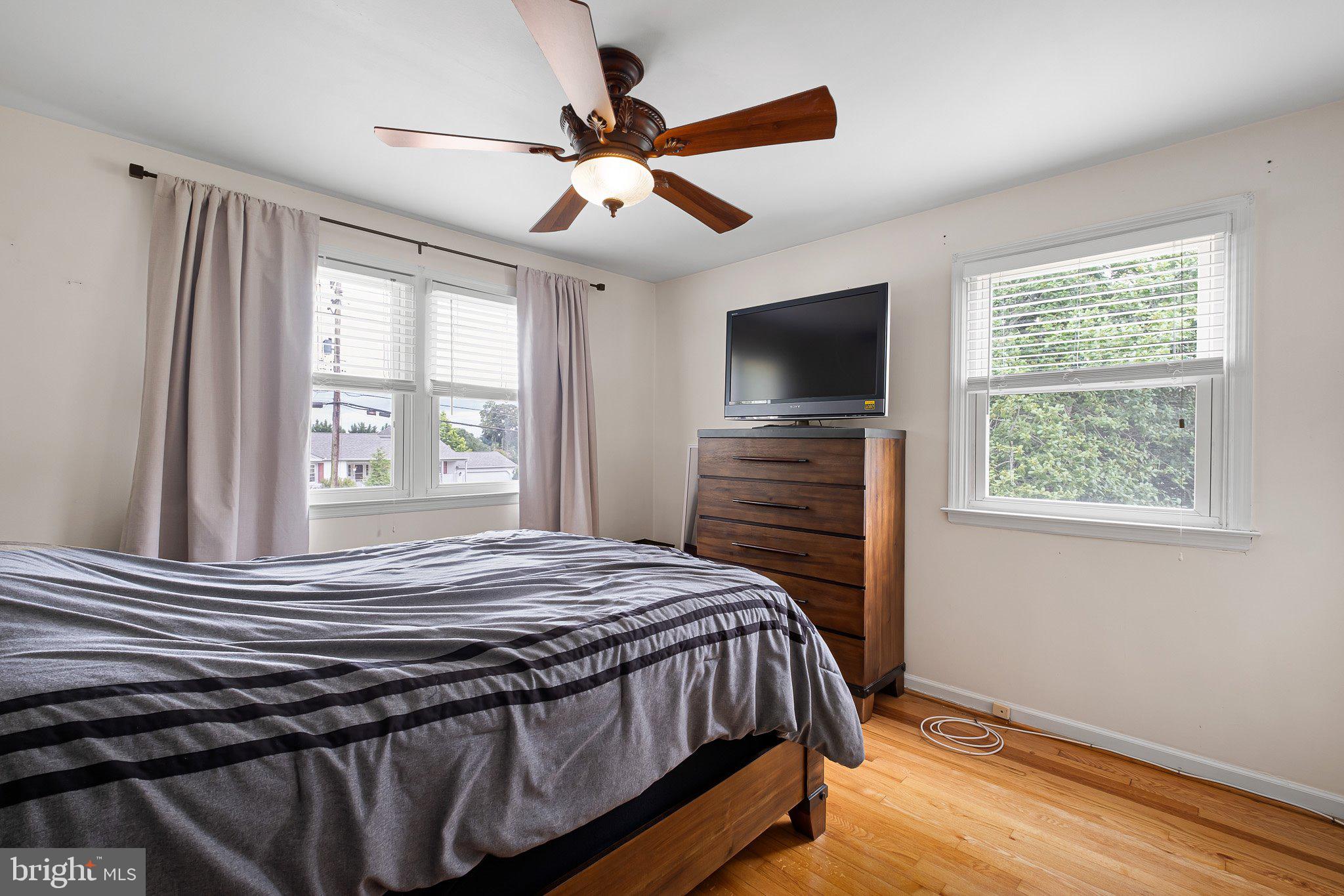 603 Milltown Road Wilmington, DE 19808 - Photo 14 of 28 a bedroom with a bed and a flat screen tv