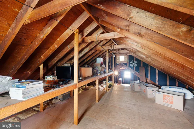 a view of an chairs and tables on the balcony