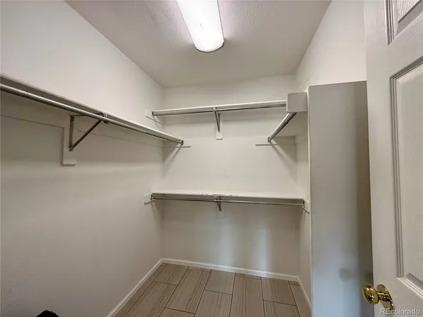 a view of an empty walk in closet