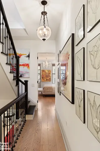 a bathroom with a double vanity sink mirror and shower